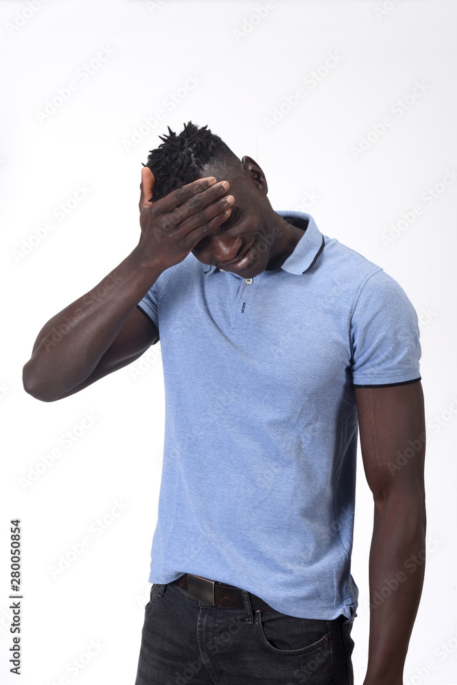 african man with headache on white background african man with headache on white background