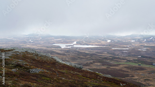 Norwegian landscape covered in mist.