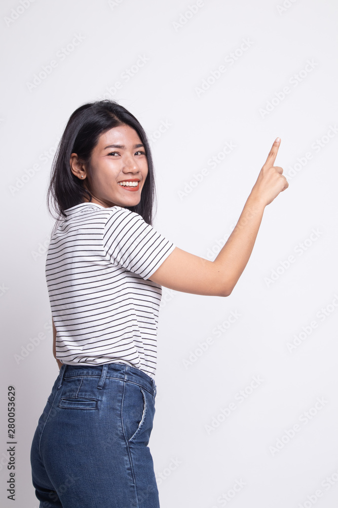 Back of Asian woman touching the screen with her finger. Back of Asian woman touching the screen with her finger.