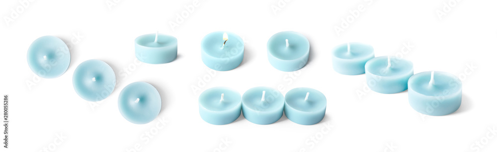 Set with decorative blue candles on white background. Banner design Set with decorative blue candles on white background. Banner design