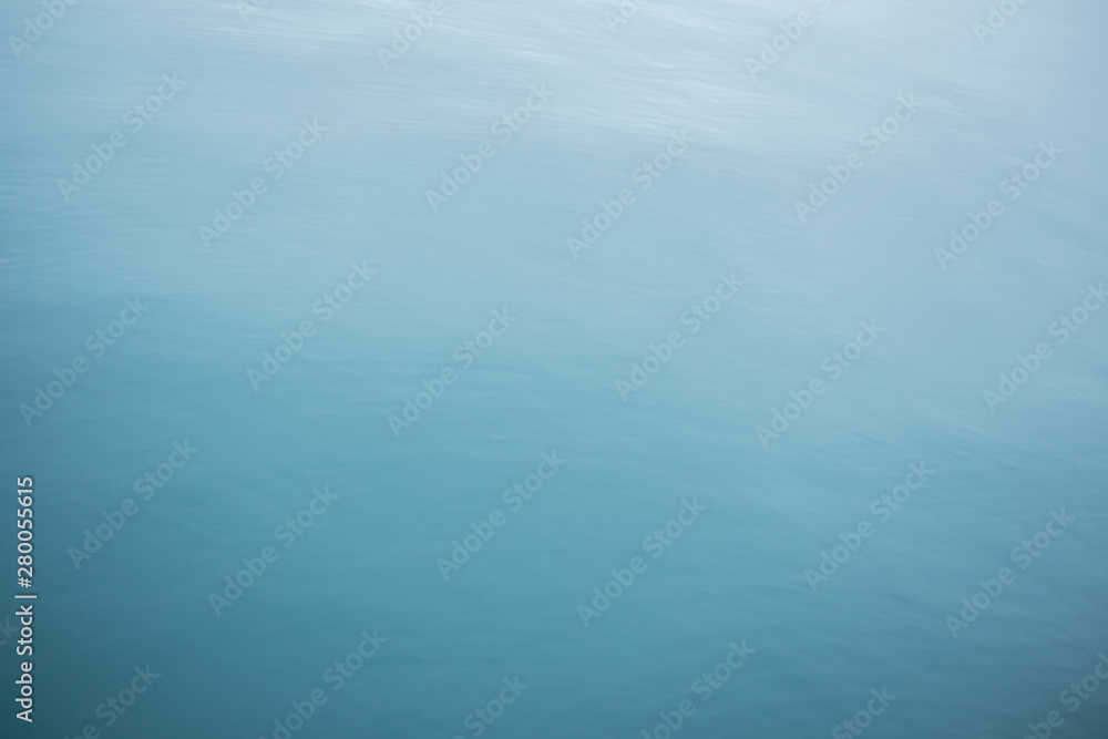 still blue water background with copy space for text or image