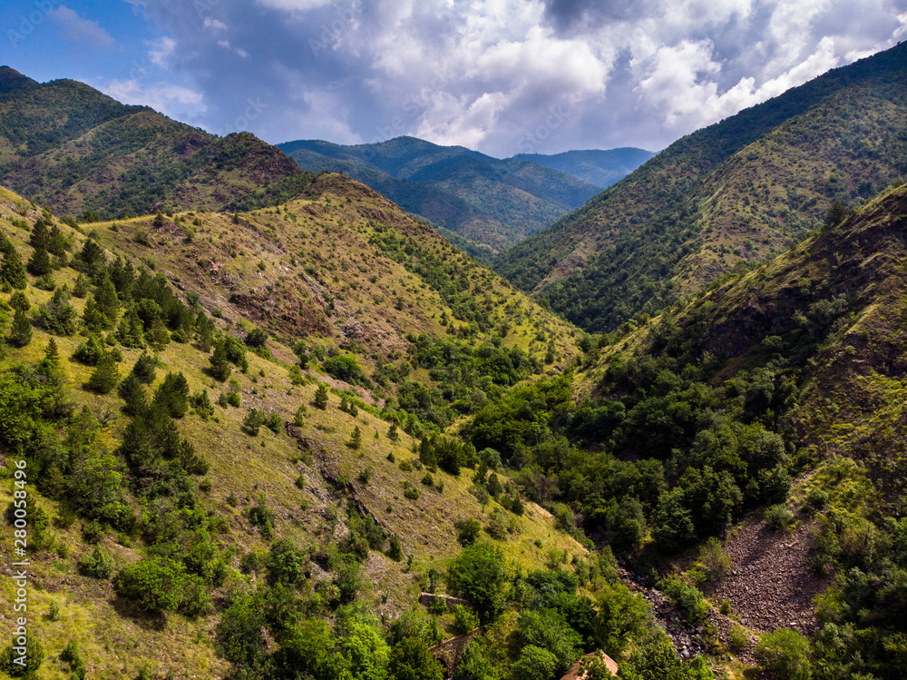 Aerial view of mountain and forest, cloudy day. Near the Ibar river and Maglic castle in Serbia