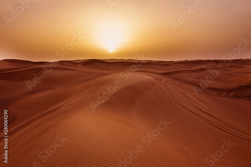 Sunset in desert in UAE  Sand dunes in United Arab Emirates
