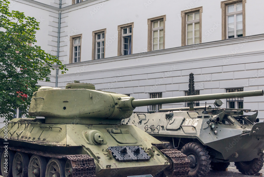 Tank in the street of Budapest outside the museum in a cloudy day. Tank in the street of Budapest outside the museum in a cloudy day.