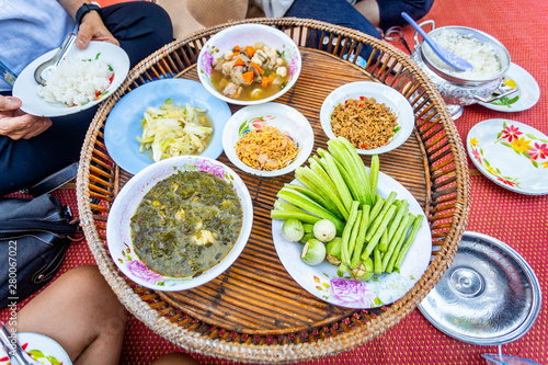 Thai Traditional Northern or Isan Food Dinner (Kantoke or Khantoke) for Serve on Thai Mat.