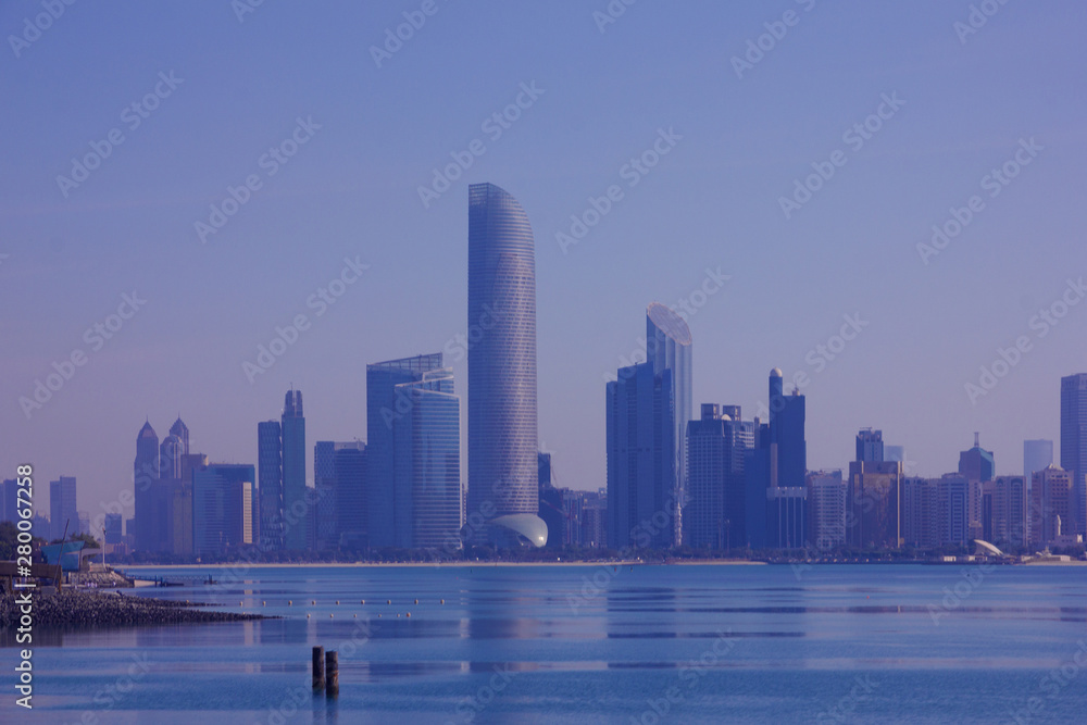 Abu Dhabi skyscrapers city landscape view in blue colours, UAE