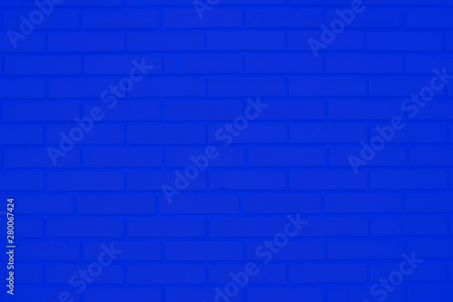 A blue brick wall is a good backdrop. © Sergey