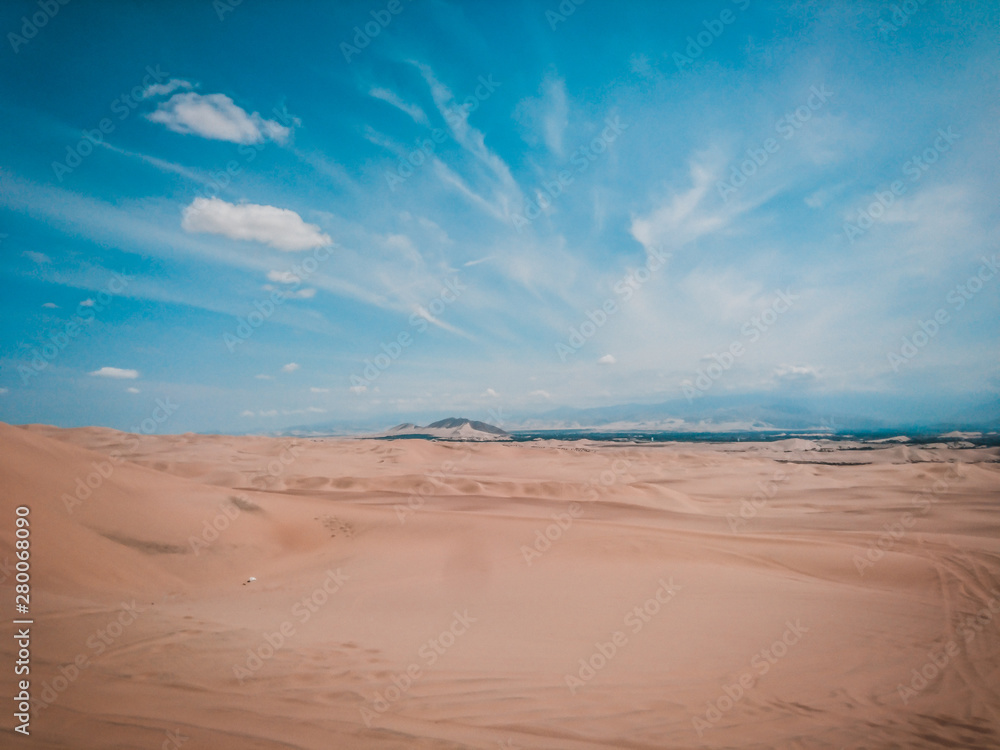 Connect with nature and tourism. Arid desert that connects with a blue sky and sand. Connect with nature and tourism. Arid desert that connects with a blue sky and sand.