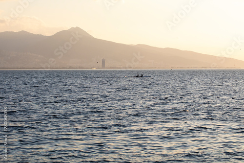 Sunset and Fisherman