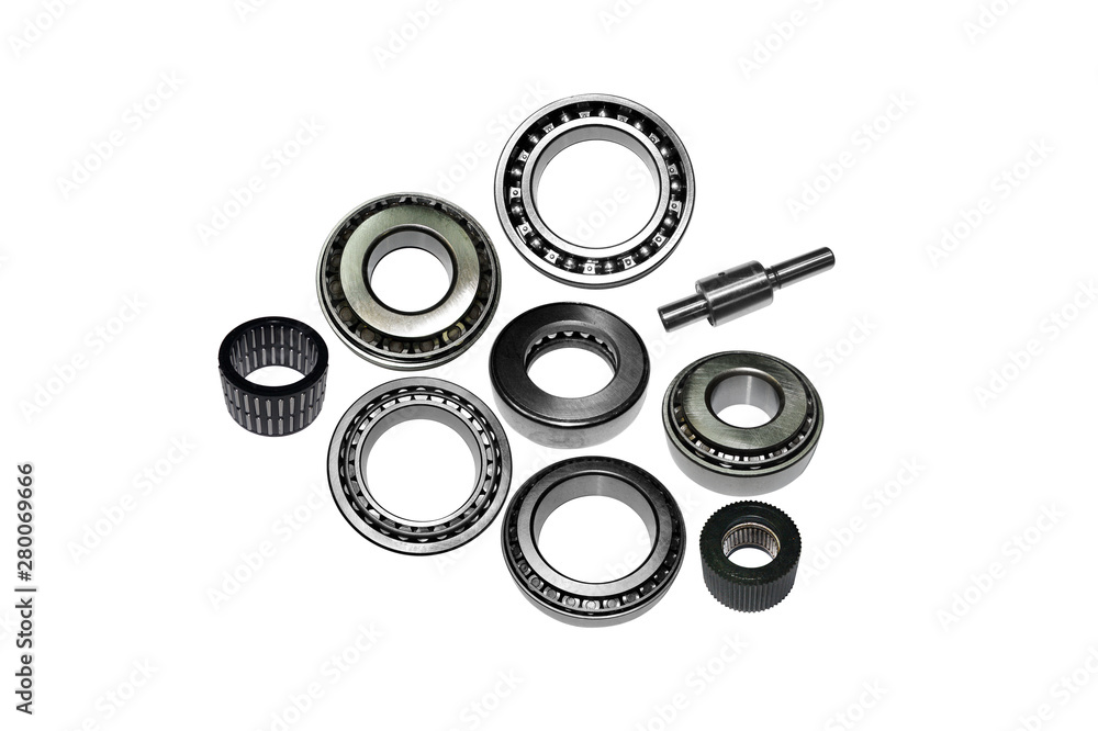 Different types of automotive bearings isolated on white background