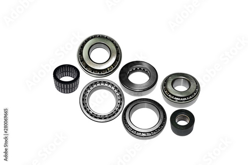 Different types of automotive bearings isolated on white background