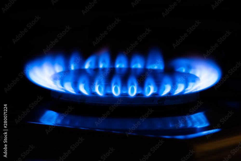 closeup of a single blue gas flame in front of a black background, Gronings gas closeup of a single blue gas flame in front of a black background, Gronings gas