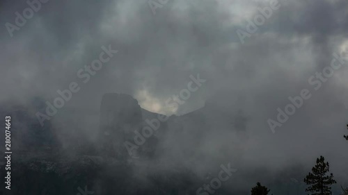 Wallpaper Mural Timelapse of clouds moving around a mountain peak in the Dolomites, Italy Torontodigital.ca