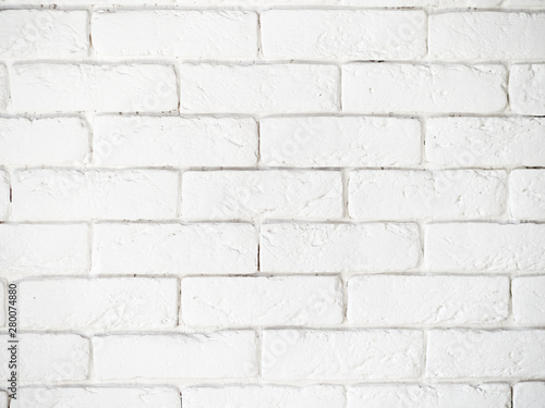 Medium shot of white painted misty brick wall for design background or texture