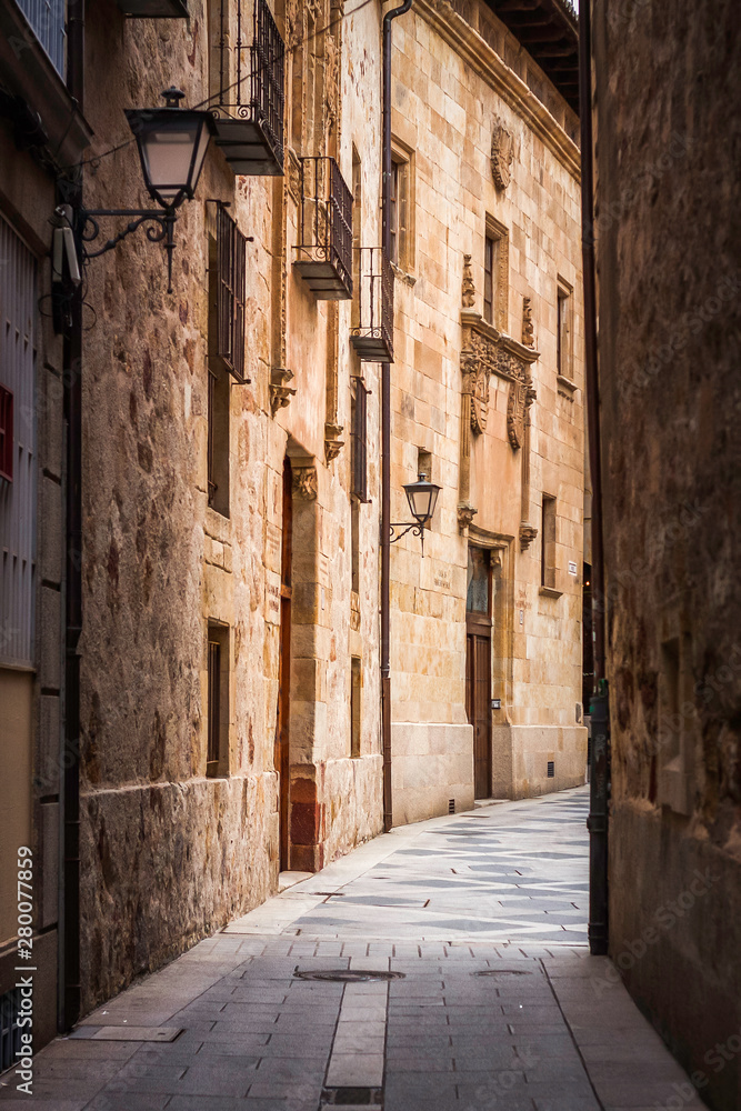 STREET WITH STONE HOUSES IN THE CITY OF SPAIN