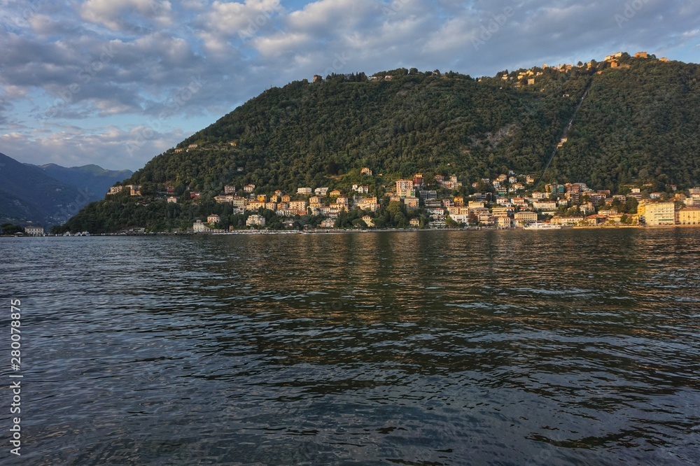 The city of Como in the rays of the setting sun.