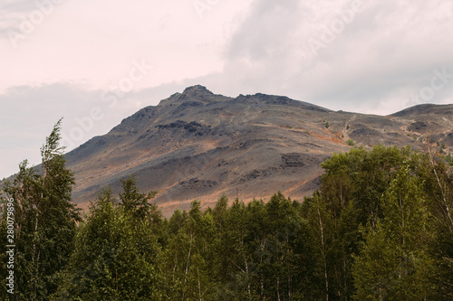 landscape with landscape with bald mountains polluted copper mining factory in Karabash, Russia, Chelyabinsk region, the dirtiest city on Earth photo