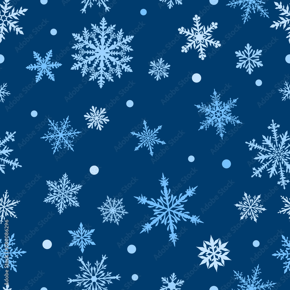 Christmas seamless pattern of complex big and small snowflakes in white colors on blue background Christmas seamless pattern of complex big and small snowflakes in white colors on blue background