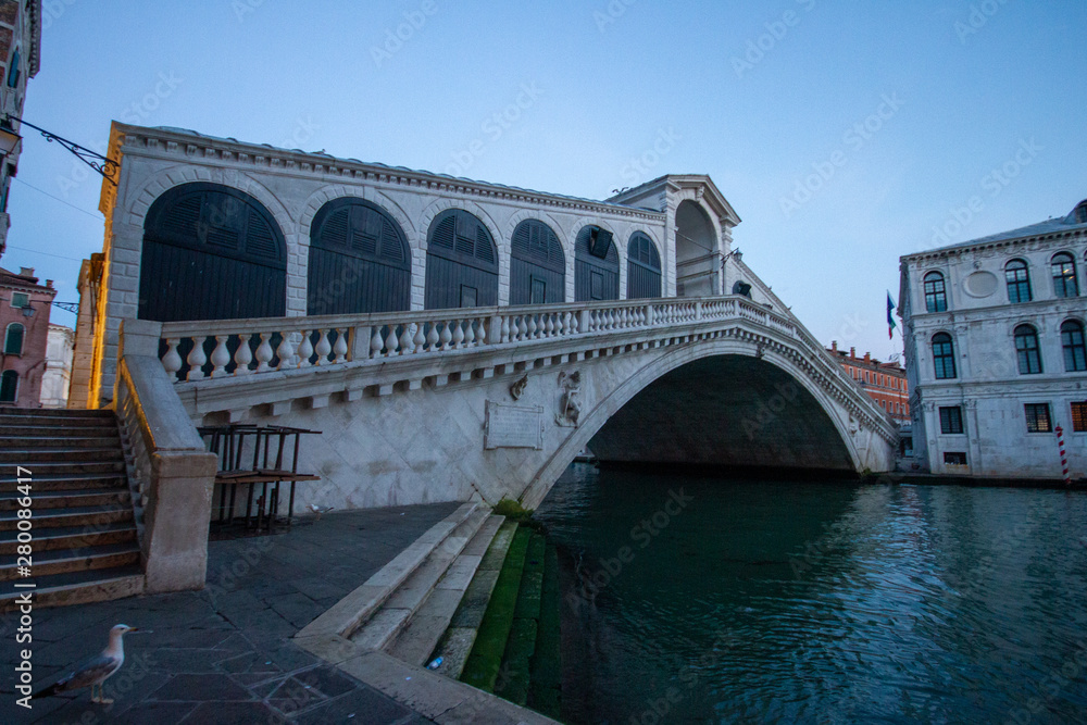 Rialto bridge at sunrise in Venice, Italy