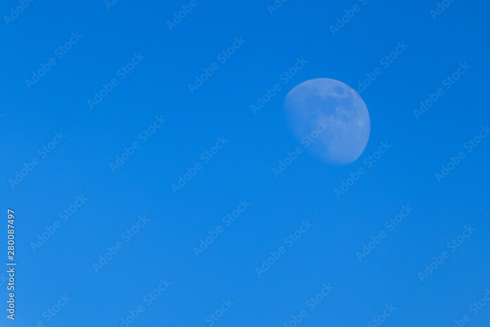 Moon in the blue sky, there is copy space