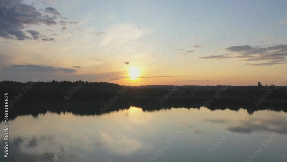 Aerial view of the lake in the middle climatic zone , roads and villages surrounding it Aerial view of the lake in the middle climatic zone , roads and villages surrounding it