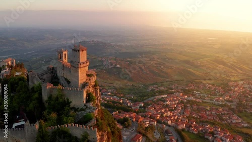 Flying over the amazing hilltop fortresses on Monte Titano in San Marino. San Marino one of the smallest countries in the world and completely surrounded by Italy. photo