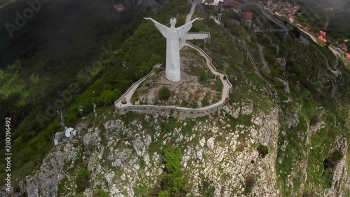 View at green hill with statue in Maratea town in Italy
