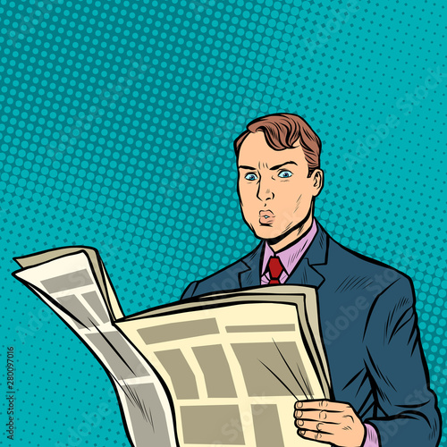 man reading a newspaper