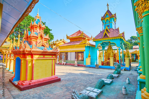 The colorful shrines of Thanboddhay monastery, Monywa, Myanmar photo