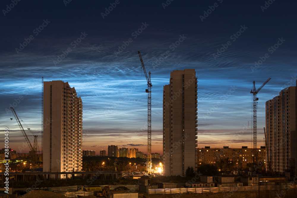 Scenery industrial landscape with noctilucent clouds
