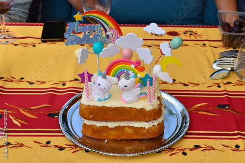 Home made light unicorn birthday Victoria sponge cake with your favourite strawberry jam, whipped cream and white icing. United Kingdom, English countryside, Rothwell photo