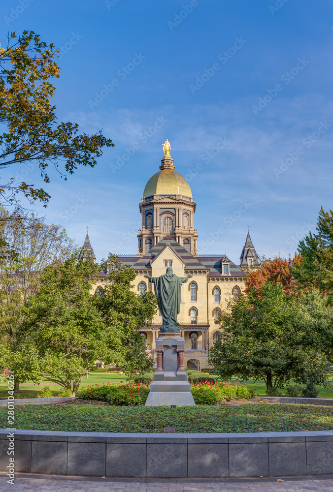Jesus Statue and Golden Dome on the Campus of Notre Dame University