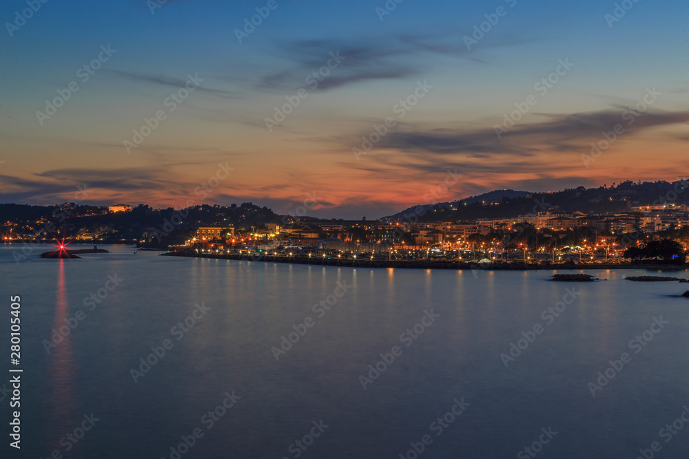 View of the port of Beaulieu-sur-Mer, France at sunset