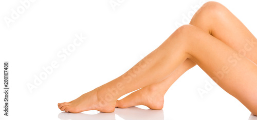 Woman barefoot legs on white background, isolated. Varicose veins concept.