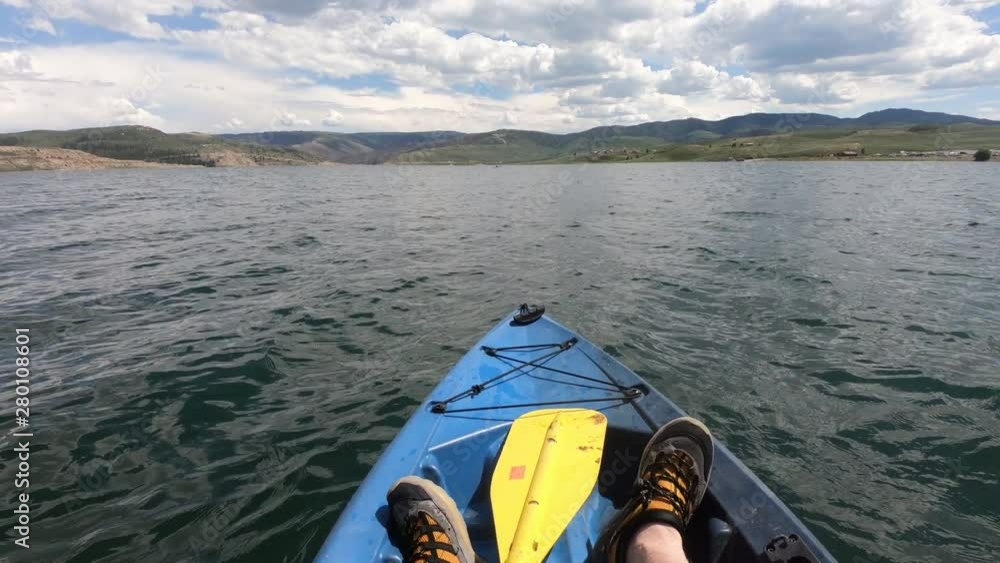 Kayak recreation mountain lake on water POV. Kayak mountain lake recreation on water. Recreation and sport leisure activity on water. Hot summer day. Exploring, fishing, weekend. Kayak recreation mountain lake on water POV. Kayak mountain lake recreation on water. Recreation and sport leisure activity on water. Hot summer day. Exploring, fishing, weekend.