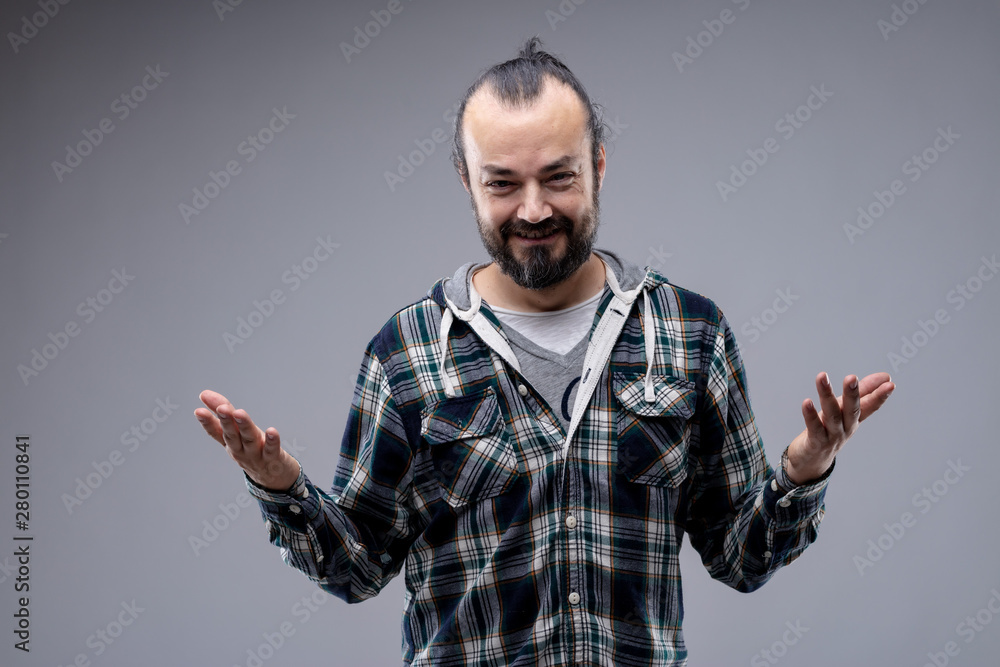 Benevolent smiling man opening his arms Benevolent smiling man opening his arms