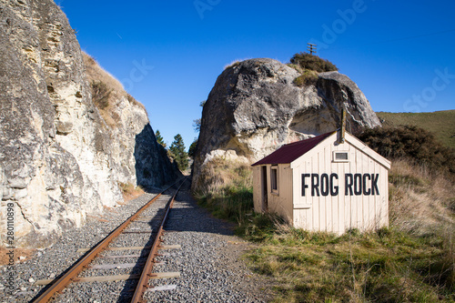 A historic railway station at Frog Rock alongside the Weka Pass Railway through scenic limestone outcrops and past vineyards from Waipara to Waikari in Canterbury, New Zealand