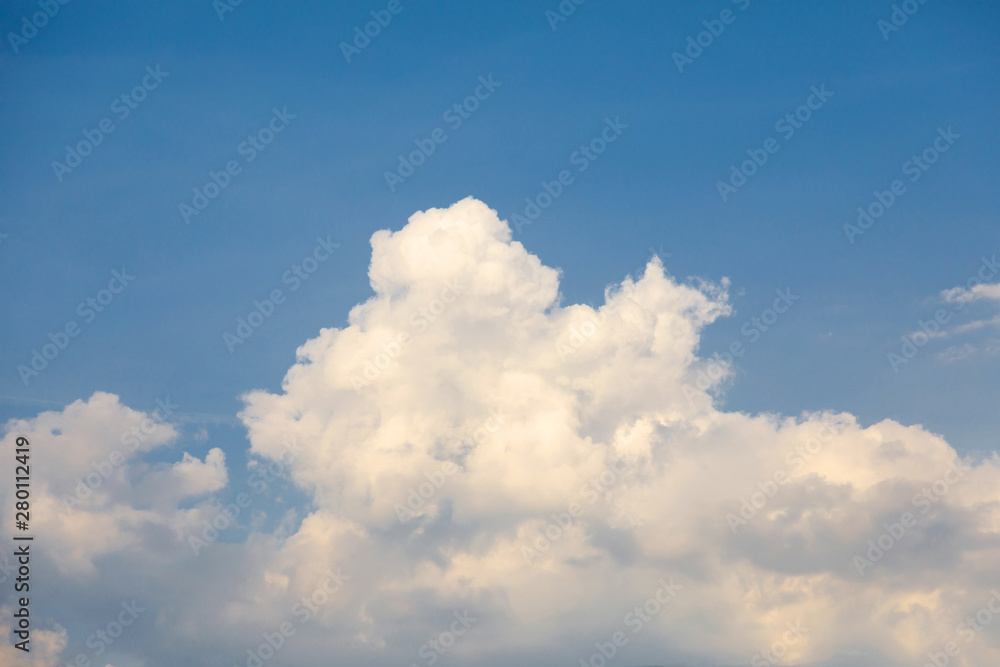 Blue sky with white and soft cumulus clouds in springtime. Blue sky with white and soft cumulus clouds in springtime.