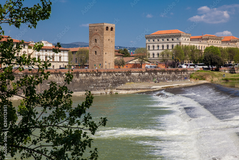 Arno river and Torre della Zecca a defense tower of Florence on the east side of the city Arno river and Torre della Zecca a defense tower of Florence on the east side of the city