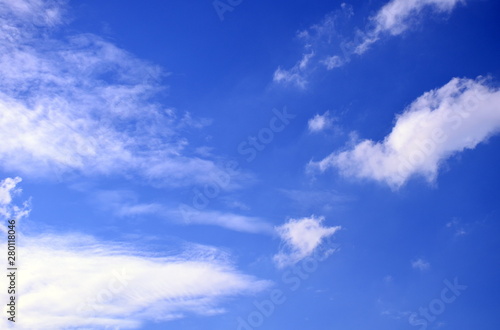 White clouds on blue sky background,use for backdrop or web design,soft focus.