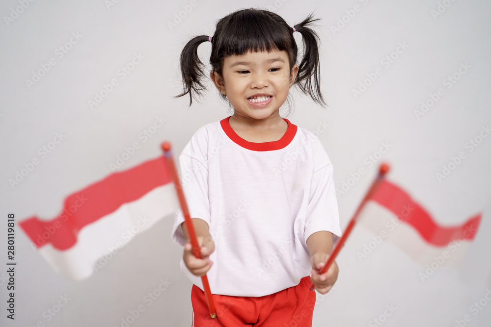 happy indonesian kid with flag over white background happy indonesian kid with flag over white background