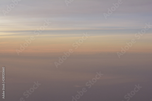 Blue Sky white cloud sun light during sunset or sunrise background © Khunatorn