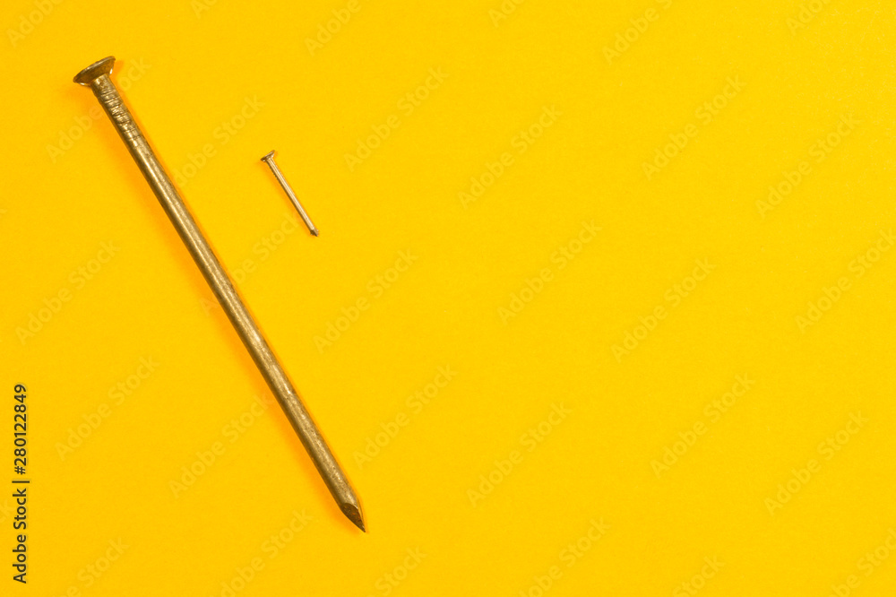 Nails on a yellow background Nails on a yellow background