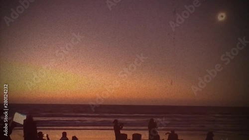 Total Eclipse where numerous people recording with thier mobile phones at La Serena´s beach in Chile. photo