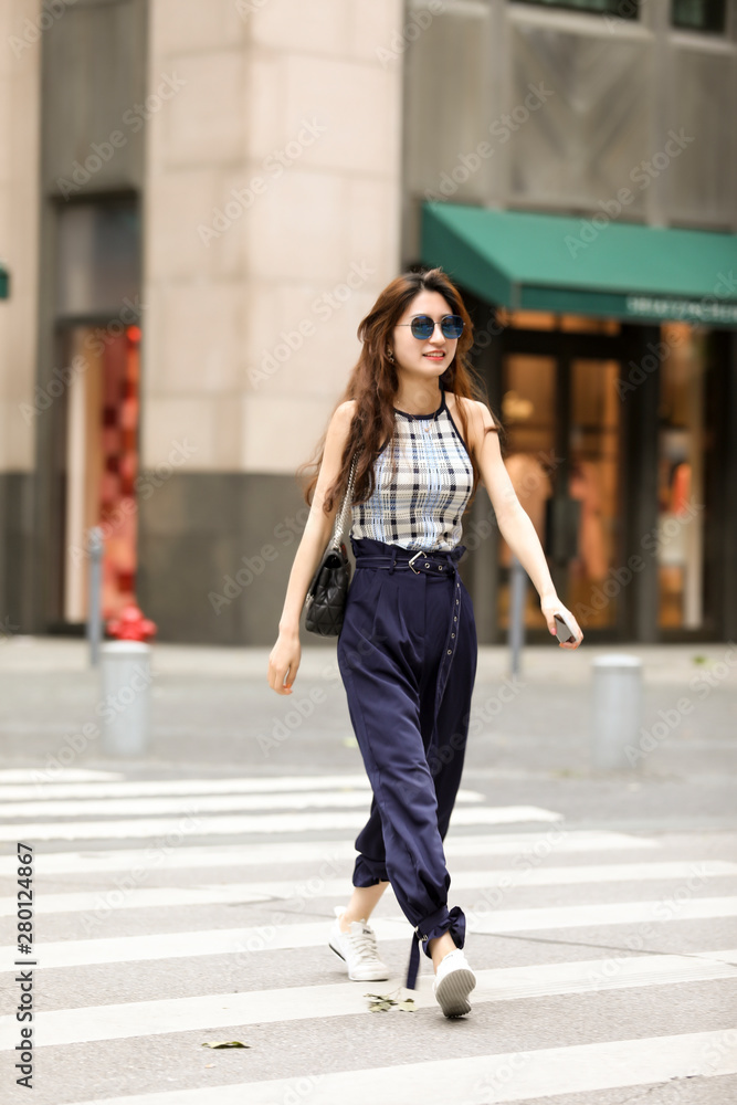 Asian fashion girl on the street in Shanghai