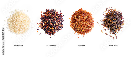 Creative layout made of organic white rice, black rice, red rice, wild rice isolated on white background.Flat lay. Food concept. photo