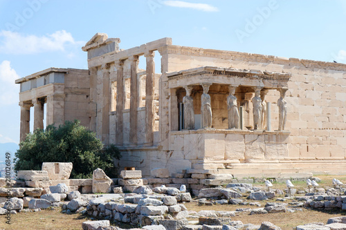 View of the facade with caryatids of ancient Greek temple Erechtheion on the north side of the Athenian Acropolis in Athens Greece