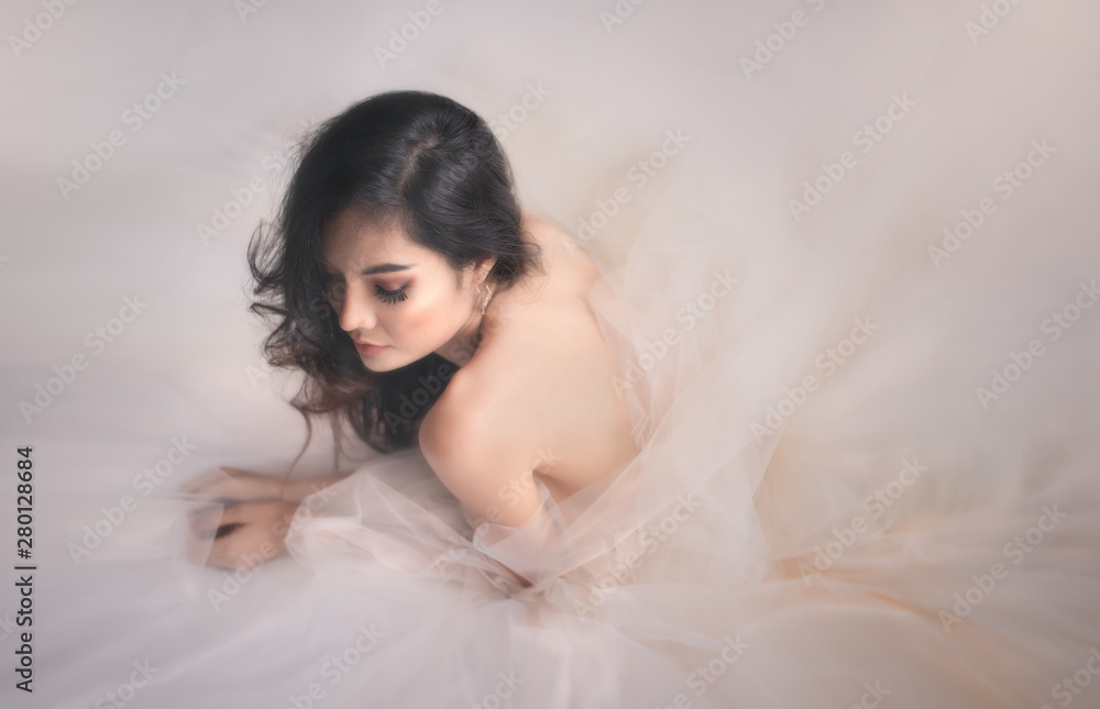 Asian women wear sexy lingerie with nude style photos in vintage color tones. Concepts, art and entertainment Asian women wear sexy lingerie with nude style photos in vintage color tones. Concepts, art and entertainment