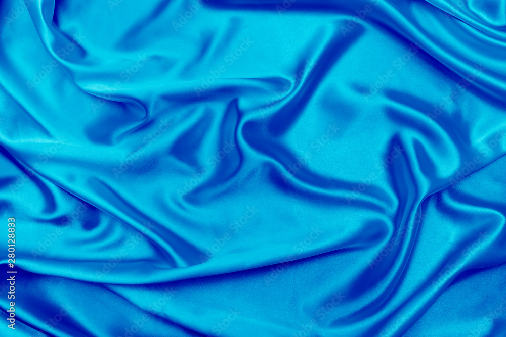 Obraz premium Blue satin fabric texture background