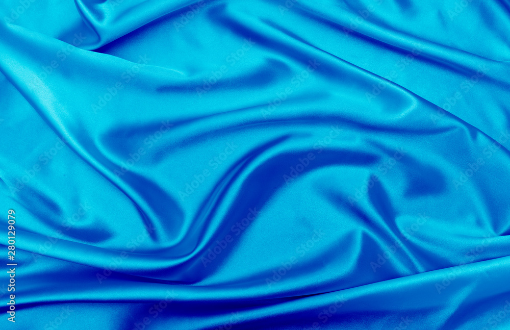 Obraz premium Blue satin fabric texture background